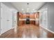 Spacious kitchen featuring wood cabinets, stainless steel appliances, and hardwood flooring at 456 Crestmont Ln, Canton, GA 30114