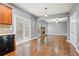 Open-concept living area showcasing hardwood floors, natural light, and seamless flow from the kitchen at 456 Crestmont Ln, Canton, GA 30114