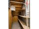 Under-stair storage featuring shelving at 456 Crestmont Ln, Canton, GA 30114