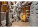 Unfinished basement with water heaters, duct work, and storage space at 710 Devon Hill Ct, Roswell, GA 30075