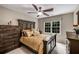 Bedroom featuring wooden furniture and natural light at 710 Devon Hill Ct, Roswell, GA 30075