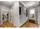 Spacious walk-in closet with custom shelves and wood flooring at 710 Devon Hill Ct, Roswell, GA 30075