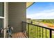 Apartment balcony with black iron railing and views of the surrounding area at 1195 Milton Se Ter # 1407, Atlanta, GA 30315