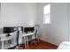 Bright bedroom with two desks, rolling chairs and a large window offering natural light at 1195 Milton Se Ter # 1407, Atlanta, GA 30315