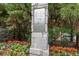 Elegant stone sign displaying the community's name surrounded by lush landscaping, creating a welcoming entrance at 1195 Milton Se Ter # 1407, Atlanta, GA 30315