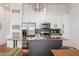 Modern kitchen with stainless steel appliances, granite countertops, and a kitchen island at 1195 Milton Se Ter # 1407, Atlanta, GA 30315