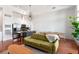 Open concept living area with modern lighting, stainless steel appliances, and hardwood floors at 1195 Milton Se Ter # 1407, Atlanta, GA 30315