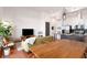 Open concept living room and kitchen with stainless appliances and modern furnishings at 1195 Milton Se Ter # 1407, Atlanta, GA 30315