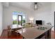 Open concept living area with modern kitchen, stainless steel appliances, natural light, and hardwood floors at 1195 Milton Se Ter # 1407, Atlanta, GA 30315
