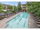 Upscale community pool with lounge chairs and nearby grilling, creating a relaxing outdoor space at 1195 Milton Se Ter # 1407, Atlanta, GA 30315