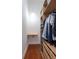 Bright walk-in closet with custom shelving and hanging storage to maximize organization at 1195 Milton Se Ter # 1407, Atlanta, GA 30315