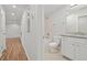 Bathroom with granite counters, a tub-shower, and plank flooring in the hallway at 305 Winding River Village Dr # F, Atlanta, GA 30350