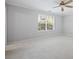 Bedroom featuring a large window allowing ample natural light at 305 Winding River Village Dr # F, Atlanta, GA 30350