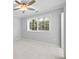Bedroom featuring a large window at 305 Winding River Village Dr # F, Atlanta, GA 30350