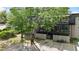 Exterior view showcasing multi-story building with balconies, parking, and green trees at 305 Winding River Village Dr # F, Atlanta, GA 30350