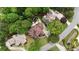 Aerial view of property surrounded by mature trees at 5309 Ashley Trce, Atlanta, GA 30360