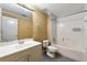 Standard full bathroom features a shower-tub combo, updated vanity, and tiled floors at 5309 Ashley Trce, Atlanta, GA 30360