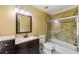 This updated bathroom has beautiful tile surround in the shower and updated vanity at 5309 Ashley Trce, Atlanta, GA 30360