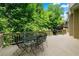 An outdoor dining set makes the wood deck a great space for outdoor living and entertaining at 5309 Ashley Trce, Atlanta, GA 30360