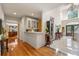 Grand foyer with high ceilings, chandelier, marble floors, and a view of the formal entrance and butler's pantry at 5309 Ashley Trce, Atlanta, GA 30360