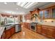 Beautiful kitchen with custom cabinets, stainless steel appliances, granite countertops, and a farmhouse sink at 5309 Ashley Trce, Atlanta, GA 30360