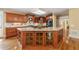 Kitchen with granite countertops, wooden cabinets, and large island for food preparation at 5309 Ashley Trce, Atlanta, GA 30360