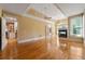 Spacious living room boasting hardwood floors, a fireplace, and large windows for ample natural light at 5309 Ashley Trce, Atlanta, GA 30360