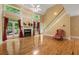 Spacious living room features a fireplace, and large windows with natural light at 5309 Ashley Trce, Atlanta, GA 30360