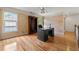 This light-filled office includes hardwood floors, built-in shelving, and bright windows at 5309 Ashley Trce, Atlanta, GA 30360