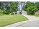Lovely home with neat front lawn and two-car garage at 5697 Brooklyn Ln, Norcross, GA 30093