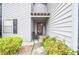 Cozy front porch with seating and landscaping, providing a welcoming entrance at 5697 Brooklyn Ln, Norcross, GA 30093