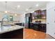 Well-equipped kitchen featuring stainless steel appliances and a functional layout at 8360 Village School Dr, Cumming, GA 30041