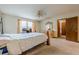 Bright bedroom featuring neutral walls and a large window at 2485 Shady Shoals Ct, Decatur, GA 30034