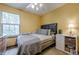 Comfortable bedroom boasts a full-size bed, ample natural light and closet at 2485 Shady Shoals Ct, Decatur, GA 30034