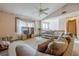 Open living room with neutral carpet, a vaulted ceiling, and a view to the dining area at 2485 Shady Shoals Ct, Decatur, GA 30034