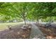 A scenic park featuring lush greenery, picnic tables, and a charming gazebo at 2485 Shady Shoals Ct, Decatur, GA 30034