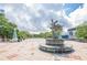 Beautiful public square with unique statues, lush trees, and open space at 2485 Shady Shoals Ct, Decatur, GA 30034