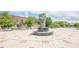 Spacious brick-laid public square featuring unique art and greenery at 2485 Shady Shoals Ct, Decatur, GA 30034
