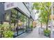 Storefront with large glass windows, outdoor seating, and a sidewalk at 2485 Shady Shoals Ct, Decatur, GA 30034