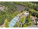 Aerial view of community amenities including lake, pool, and tennis courts at 2840 Astoria Ave, Cumming, GA 30040