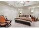 Relaxing bedroom showcases tray ceiling, recessed lighting and neutral color palette, creating a serene retreat at 2840 Astoria Ave, Cumming, GA 30040