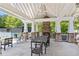 A community pavilion with fireplace and seating overlooking the tennis courts at 2840 Astoria Ave, Cumming, GA 30040
