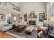 Bright living room with fireplace, and hardwood floors at 2840 Astoria Ave, Cumming, GA 30040