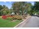 Street view of neighborhood with beautiful flower beds and landscaping at 2840 Astoria Ave, Cumming, GA 30040