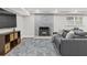Finished basement featuring a fireplace, cozy seating, and ample space for entertainment at 1042 Trailridge Pl, Atlanta, GA 30338