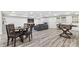 Basement features dining area, foosball table, and entertainment space at 1042 Trailridge Pl, Atlanta, GA 30338