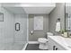 Modern bathroom with a glass-enclosed shower, sleek fixtures, and neutral tones at 1042 Trailridge Pl, Atlanta, GA 30338