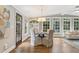 Breakfast nook with lots of windows, natural light, and a built-in shelving area at 1042 Trailridge Pl, Atlanta, GA 30338
