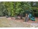 Community playground featuring swings and slides for outdoor fun at 1042 Trailridge Pl, Atlanta, GA 30338