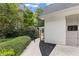 Well-manicured yard and gated access lead to the side of this beautiful home at 1042 Trailridge Pl, Atlanta, GA 30338